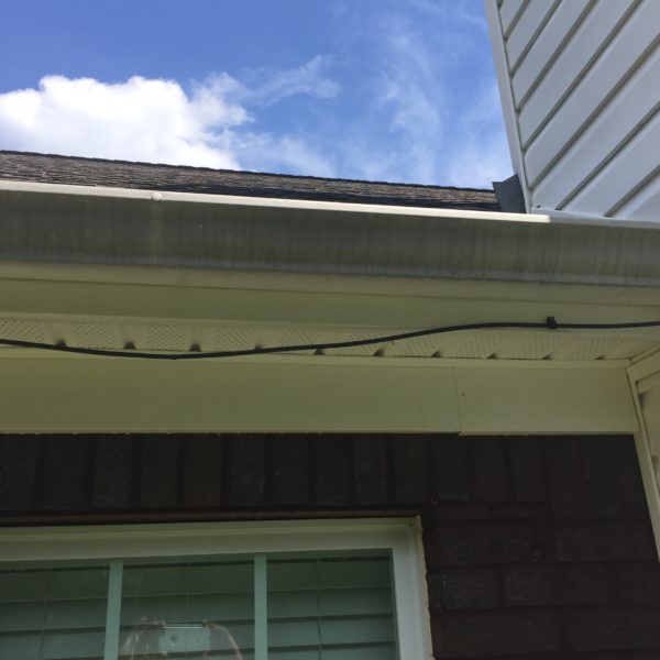 House Gutter Before Power Wash